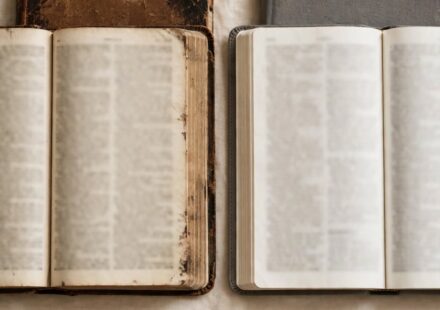 Two Bibles side by side, one older and one newer, representing a faith passed down that has taken on its own shape.